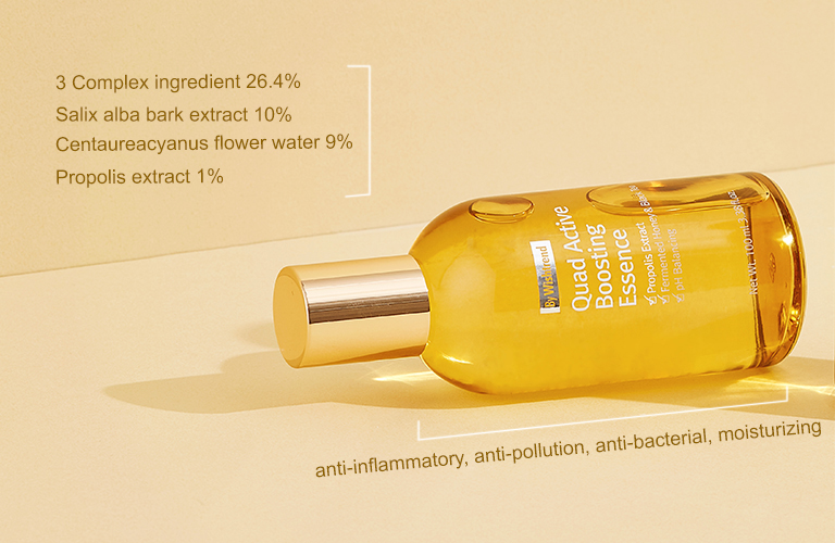 A bottle of the By Wishtrend Quad Boosting Essence laying on a surface with its properties in text next to it saying "3 complex ingredient 26.4%, salix alba bark extract 10%, centaureacyanus flower water 9%, propolis extract 1% and anti-inflammatory, anti-pollution, anti-bacterial, moisturizing"