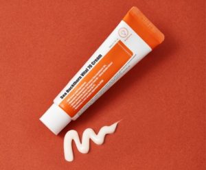 A tube of the Purito Sea Buckthorn Vital 70 Cream with some of it squeezed out in zig zag below the tube