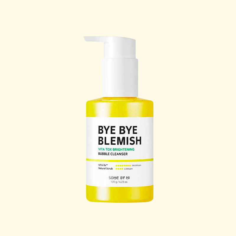 Image of the Bye Bye Blemish vita tox brightening bubble cleanser (A yellow and white pump bottle with black letterings): one of the best Korean cleansers for oily, acne-prone skin