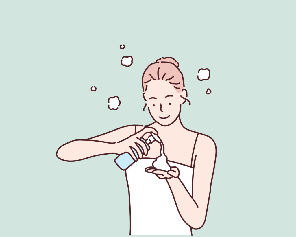 image showing woman pumping cleanser onto hands